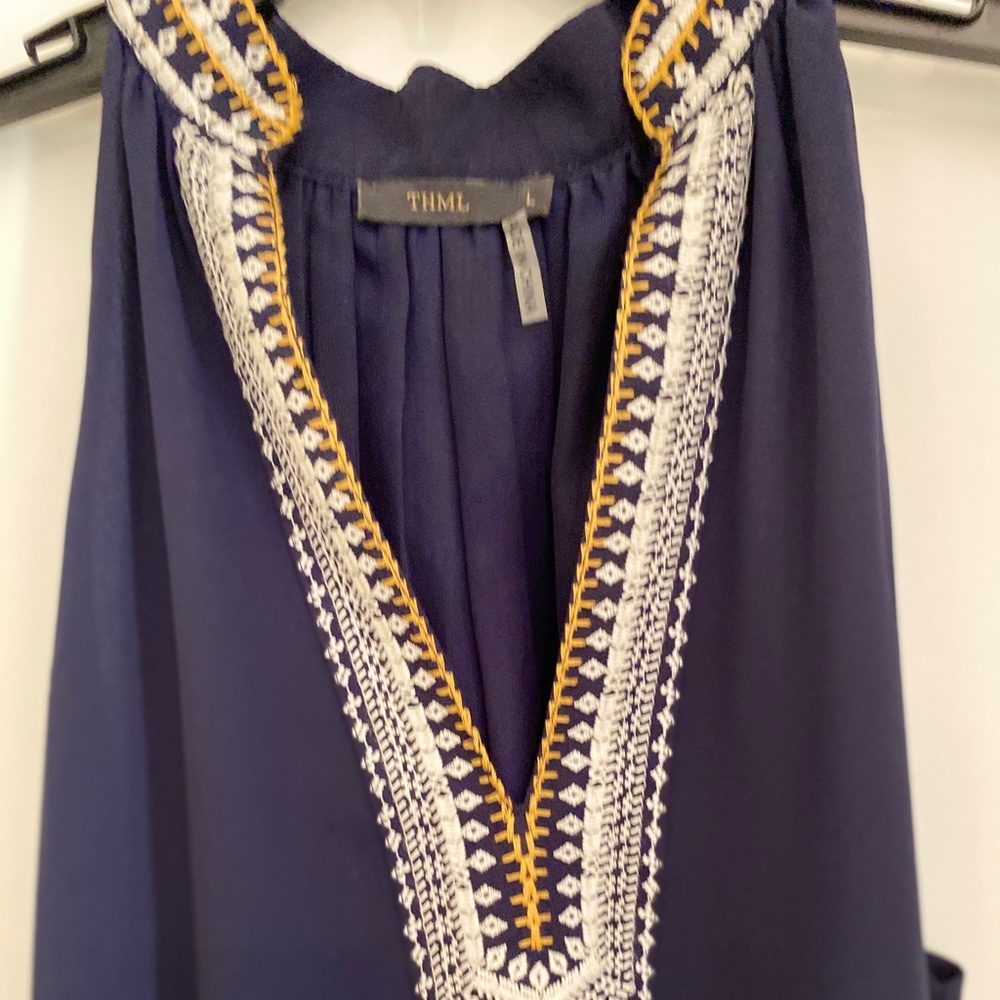 Navy sleeveless dress.